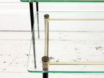 A Set of Two 1950's French Glass Nesting Side Tables