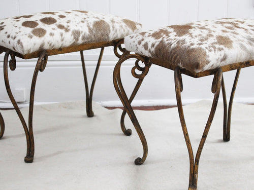 A Pair of Gilt Metal Spanish 1950's Stools with Cowhide Covering