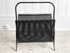 A Sculptural 1950's French Perforated Polychrome Metal Magazine Rack