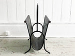 A Sculptural 1950's French Perforated Polychrome Metal Magazine Rack