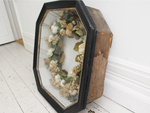 A Very Large Napoleon III Black Vitrine Frame with Flower Couronne
