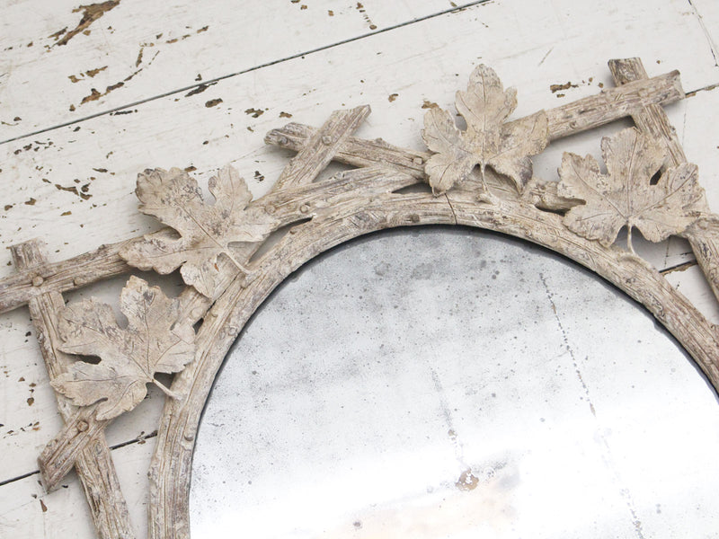 A Pair of Antique Italian Delicately Carved Mirrors with Original Oval Plates
