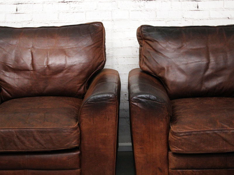 A Pair of Very Large Vintage Brown Leather Armchairs