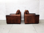 A Pair of Very Large Vintage Brown Leather Armchairs