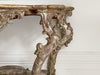 An early 18th Century Italian Pair of Carved Silver Gilt Console Tables