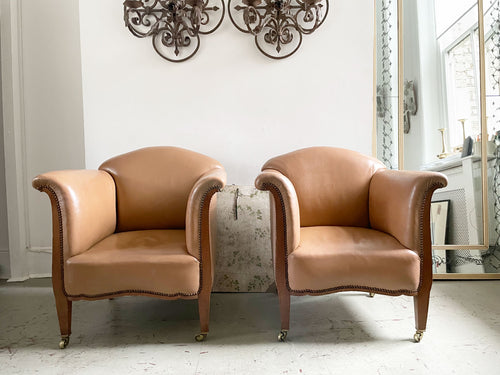 A Pair of 1940's Leather Tub Armchairs