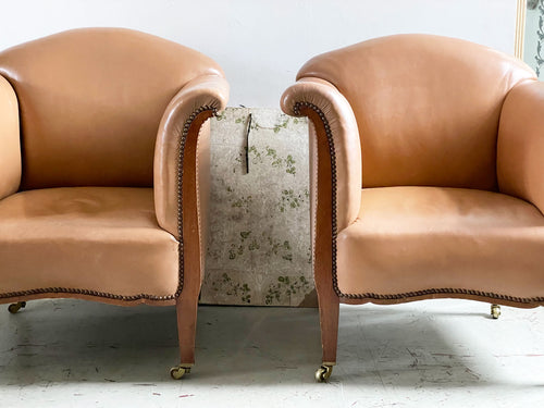 A Pair of 1940's Leather Tub Armchairs