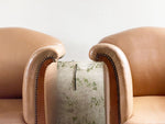 A Pair of 1940's Leather Tub Armchairs