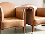 A Pair of 1940's Leather Tub Armchairs