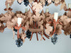 An impressive 1970's French pink metalwork grapevine chandelier