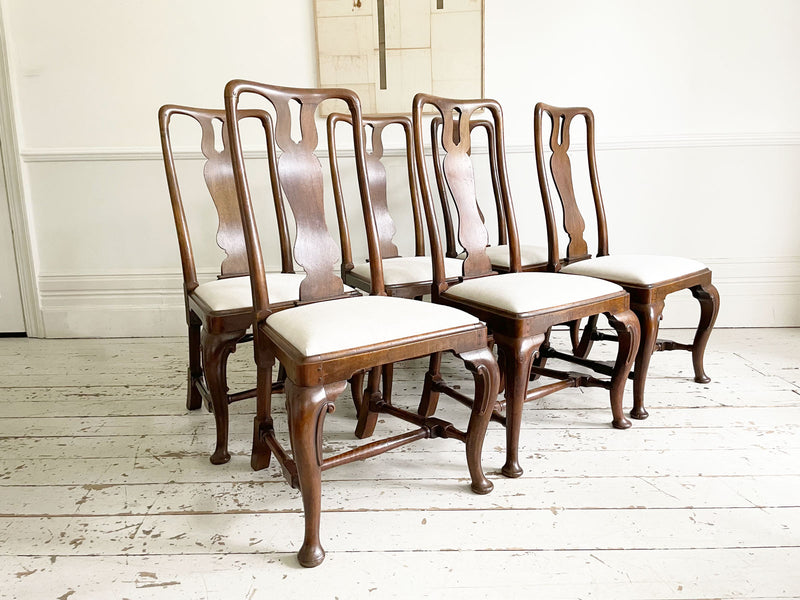 A Set of Six Georgian Walnut Dining Chairs