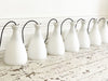A Set of 8 1950's Opaline Pendant Lights