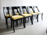 A Set of Eight Black Lacquered 1920's French Dining Chairs