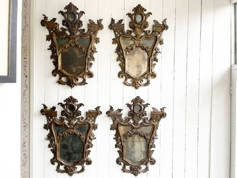 A Rare Set of Four 17th C Italian Giltwood Mirrors with Original Plates