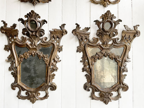 A Rare Set of Four 17th C Italian Giltwood Mirrors with Original Plates