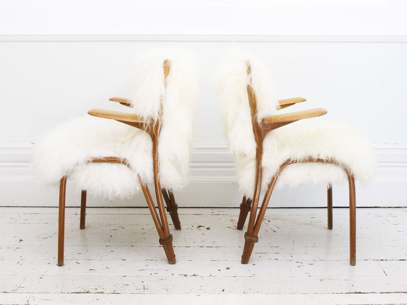 A Pair of 1940's Steiner Armchairs with Brass Detail & Icelandic Sheepskin Upholstery