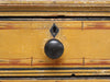 A small Regency Painted Faux Bamboo chest of drawers