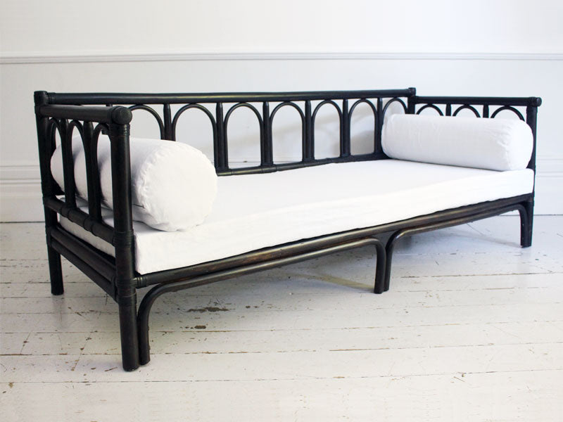 A Chic 1970's Bamboo Sofa Daybed with Antique White Linen Cushions