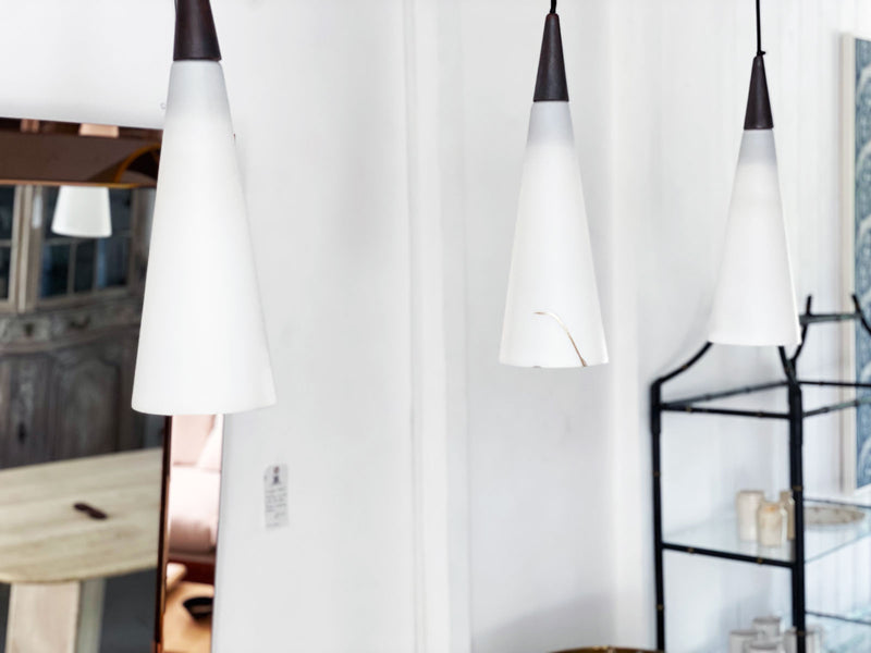 A Set of Three Mid Century French Opaque Glass Pendant Lights