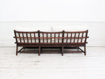 A 1950's French Bamboo Sofa and Pair of Armchairs