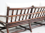 A 1950's French Bamboo Sofa and Pair of Armchairs