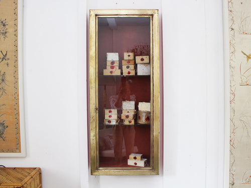 An Antique Brass Fronted Glazed Wall Mounted Shop Cabinet