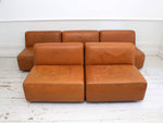 An Italian 1970's Tan Leather Five Part Modular Sofa