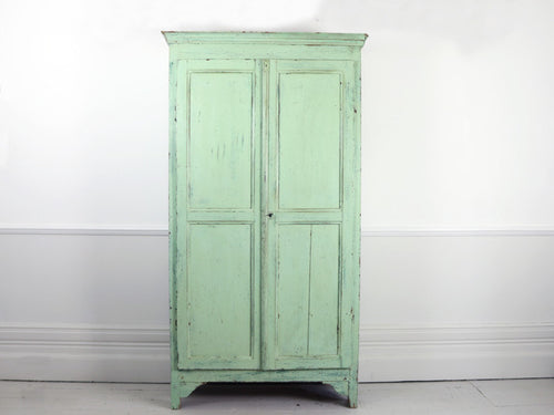 A 19th century French green painted cupboard