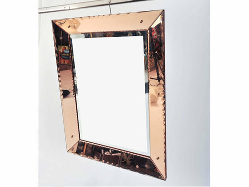 A 1970's French amber framed mirror