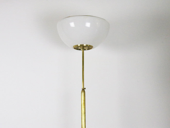 A 1970's Italian brass standing lamp with perspex shade