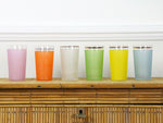 A set of six 1960's frosted, coloured glasses with gold band