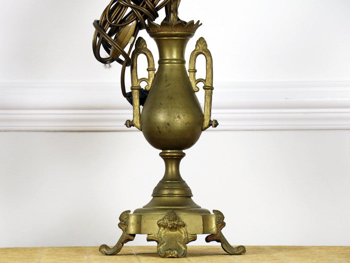 A pair of large brass and eglomisé glass flower lamps