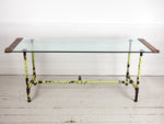 A glass, brass & steel table recycled from original Wedgwood factory