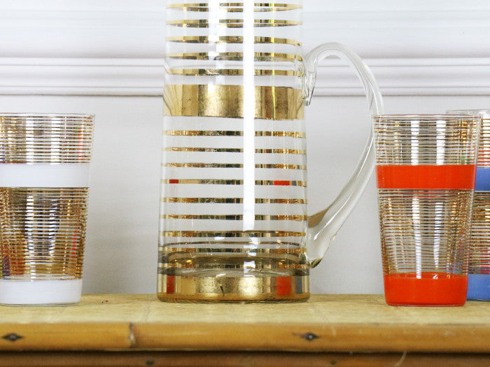8 French multicoloured and gold striped tumblers with matching jug