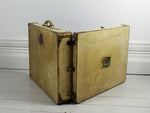 A Vellum Suitcase with Interior Hanging & Wing Shaped Handle Mounts