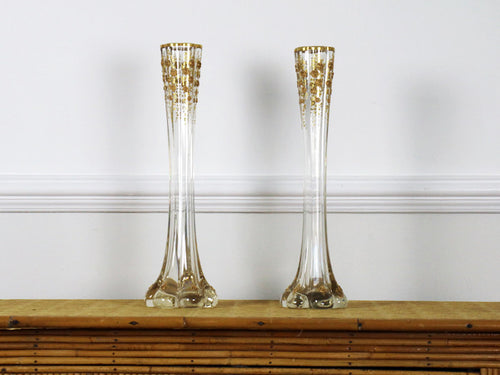A pair of fluted antique French glass vases with gold flower decoration