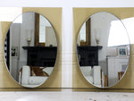 A pair of Caprotti Italian 1960's smoked and silver wall mirrors