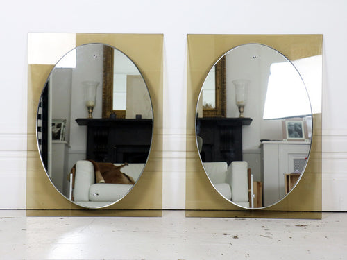 A pair of Caprotti Italian 1960's smoked and silver wall mirrors