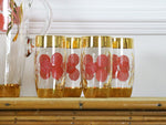 A set of 8 tumblers and matching jug with red & gold decoration