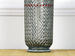 A 1950's wire mesh soda siphon