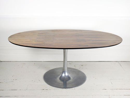 A large 1970's Arkana rosewood & aluminium tulip base dining table