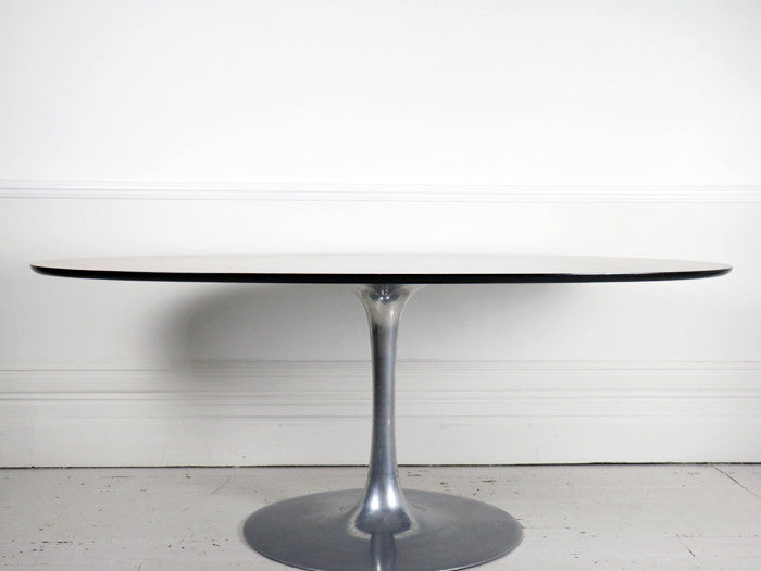 A large 1970's Arkana rosewood & aluminium tulip base dining table