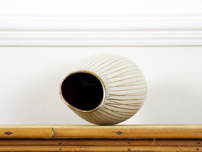 A vintage Handgemalt cream ceramic vase with gold stripes & red interior